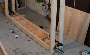 Attach beams to top shelf of workbench