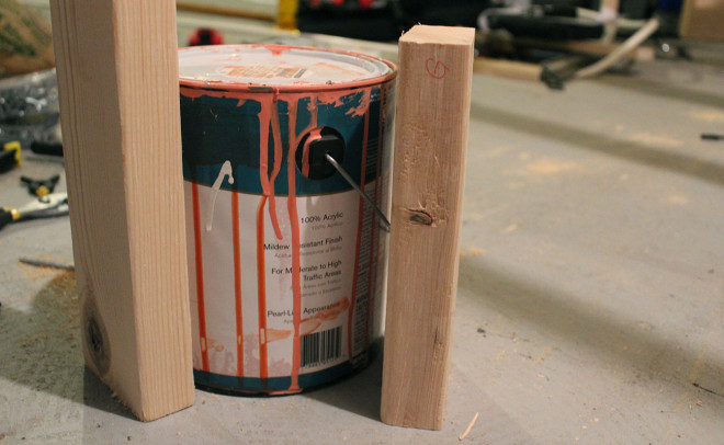 Paint cans or pieces can help make shelf level